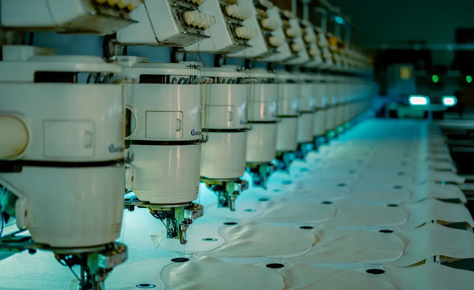 Industrial sewing machines arranged for garment production