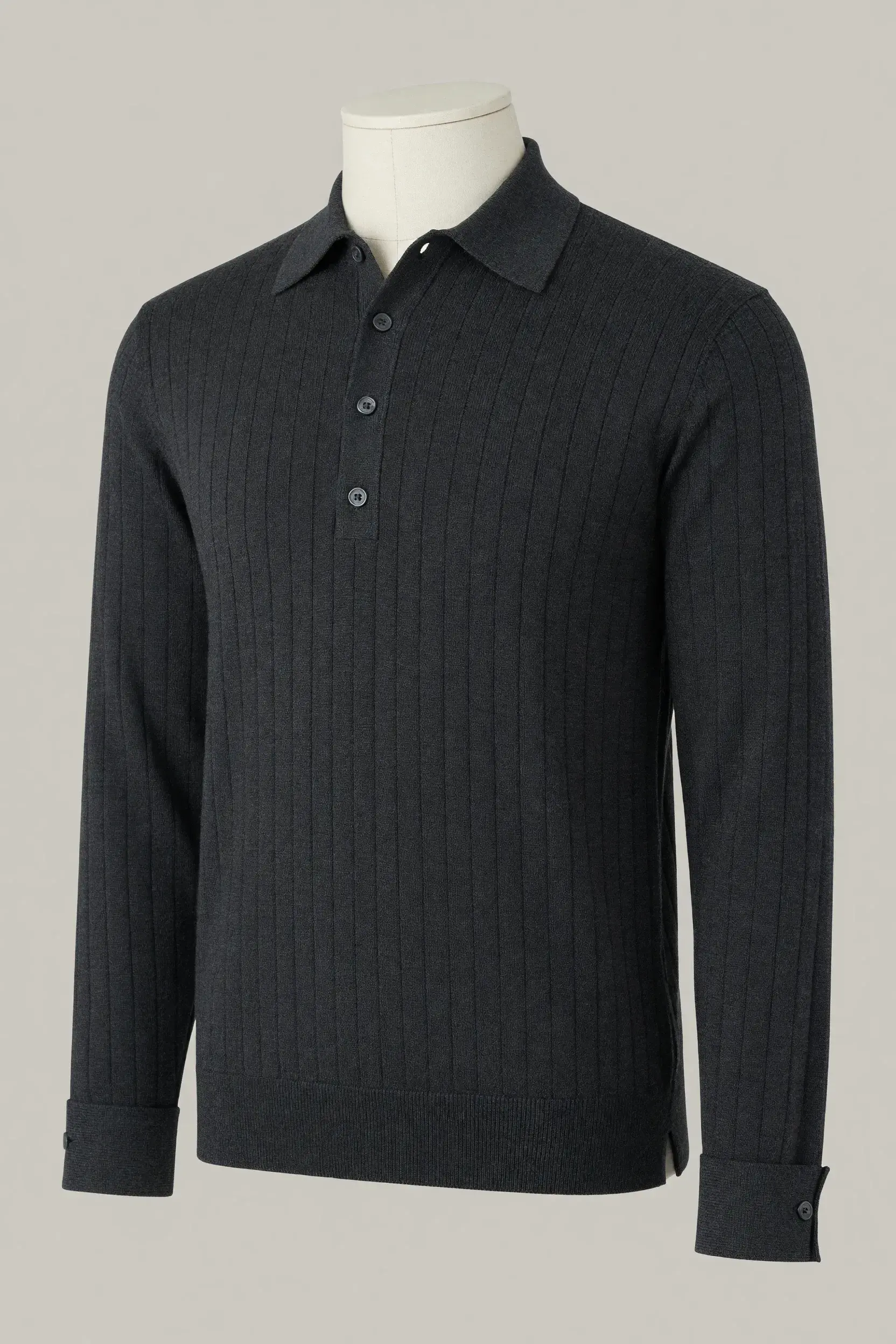 Charcoal fine-rib long-sleeve knit polo with multiple buttons, wide cuffs and side slits on a mannequin for private-label development