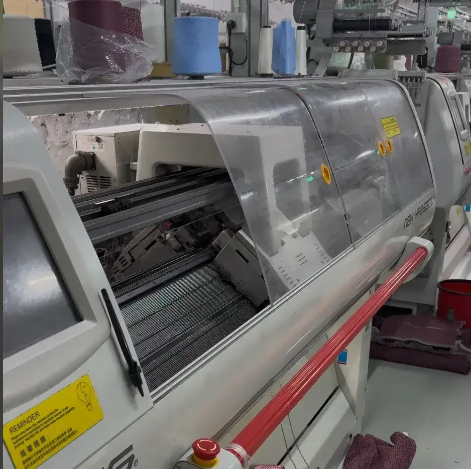Computerized knitting machine and yarn setup