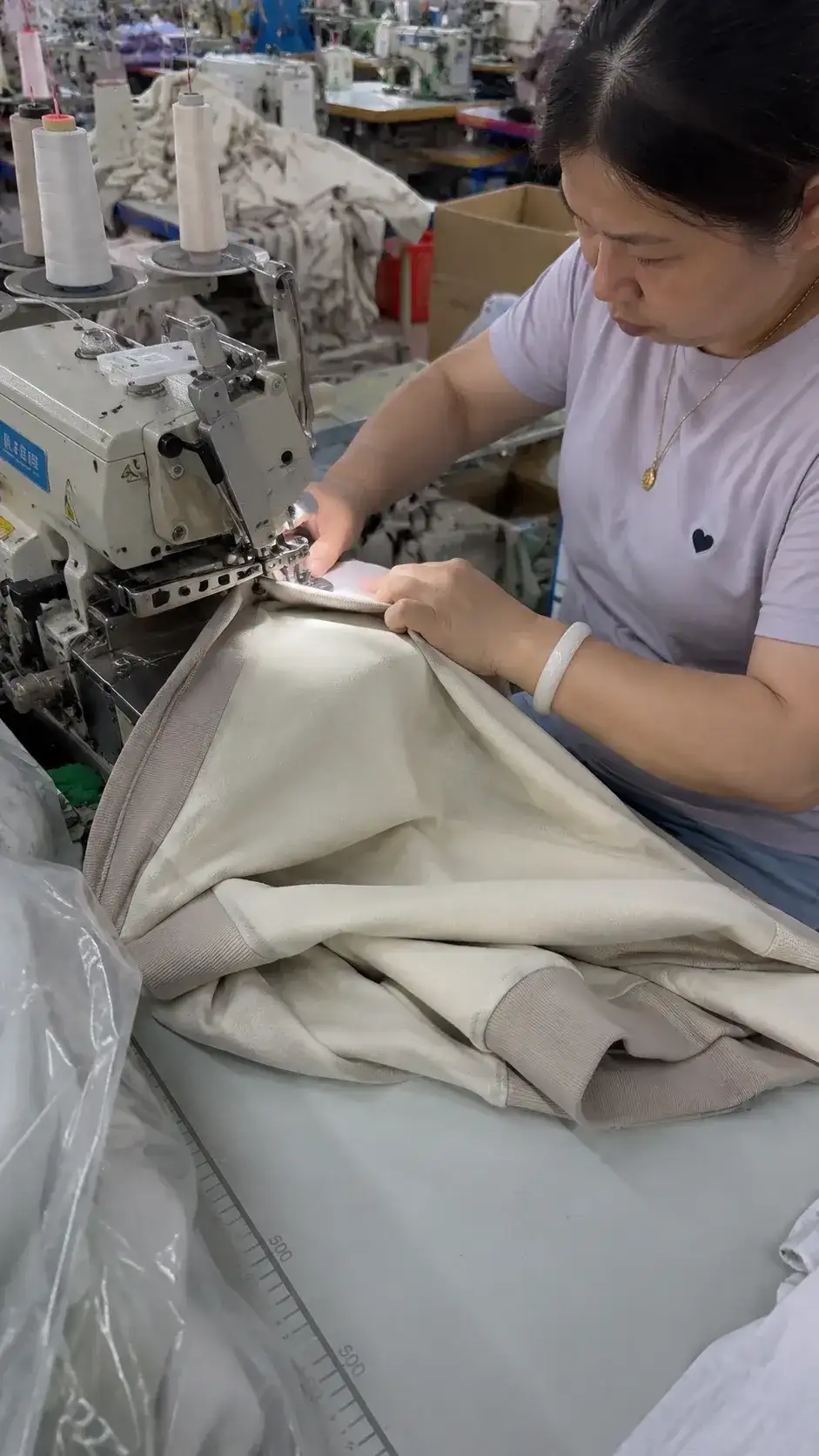 Sewing operator working on garment production