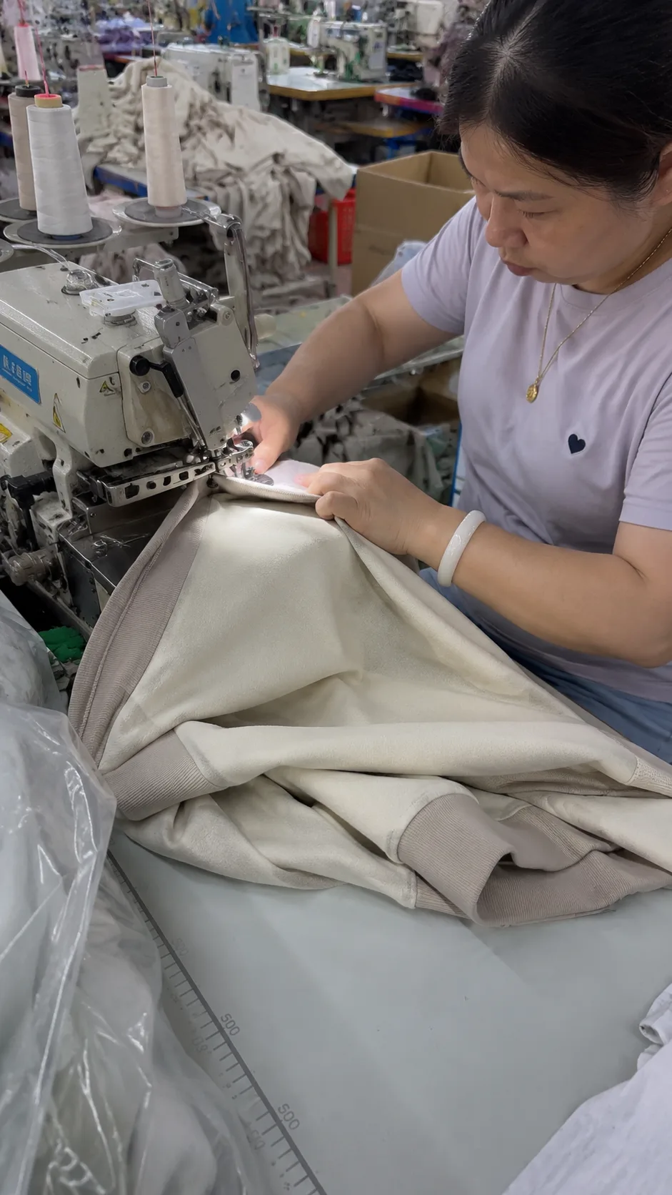 Sewing operator working on garment production