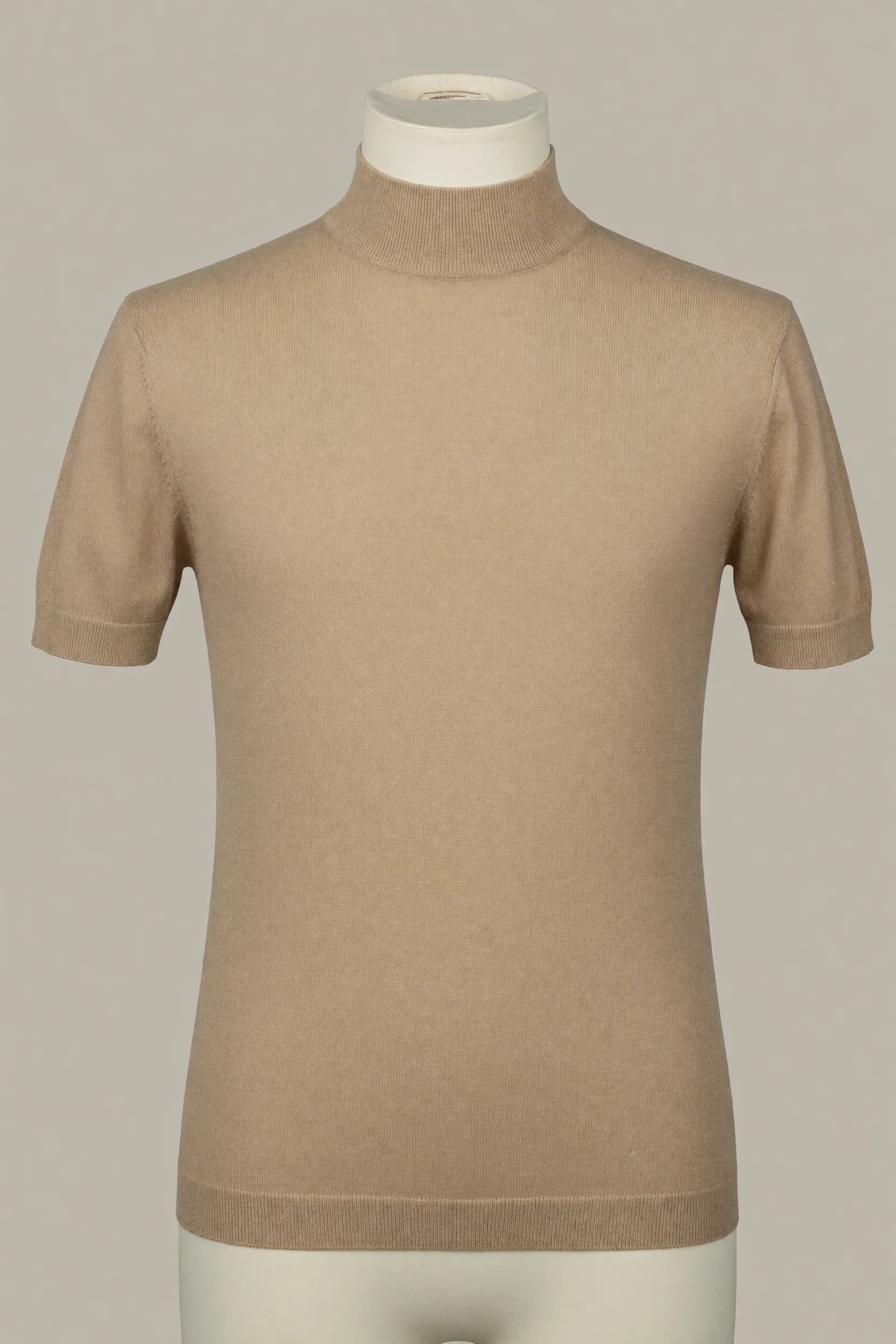 Camel slim short-sleeve mock-neck knit top shown on a torso mannequin for private-label fashion development