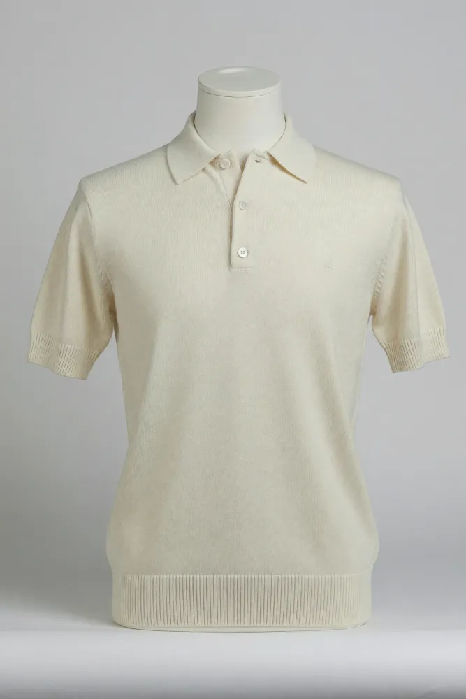 Cream fine-knit three-button short-sleeve polo fitted on a torso mannequin for OEM private-label product development