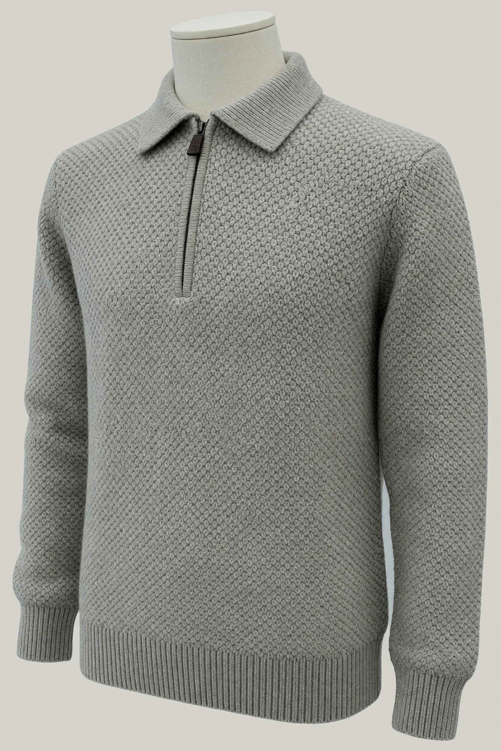 Silver grey seed-stitch zip-collar sweater shown on a headless mannequin for OEM private-label knitwear development