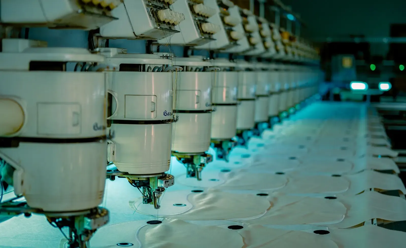 Industrial sewing machines arranged for garment production