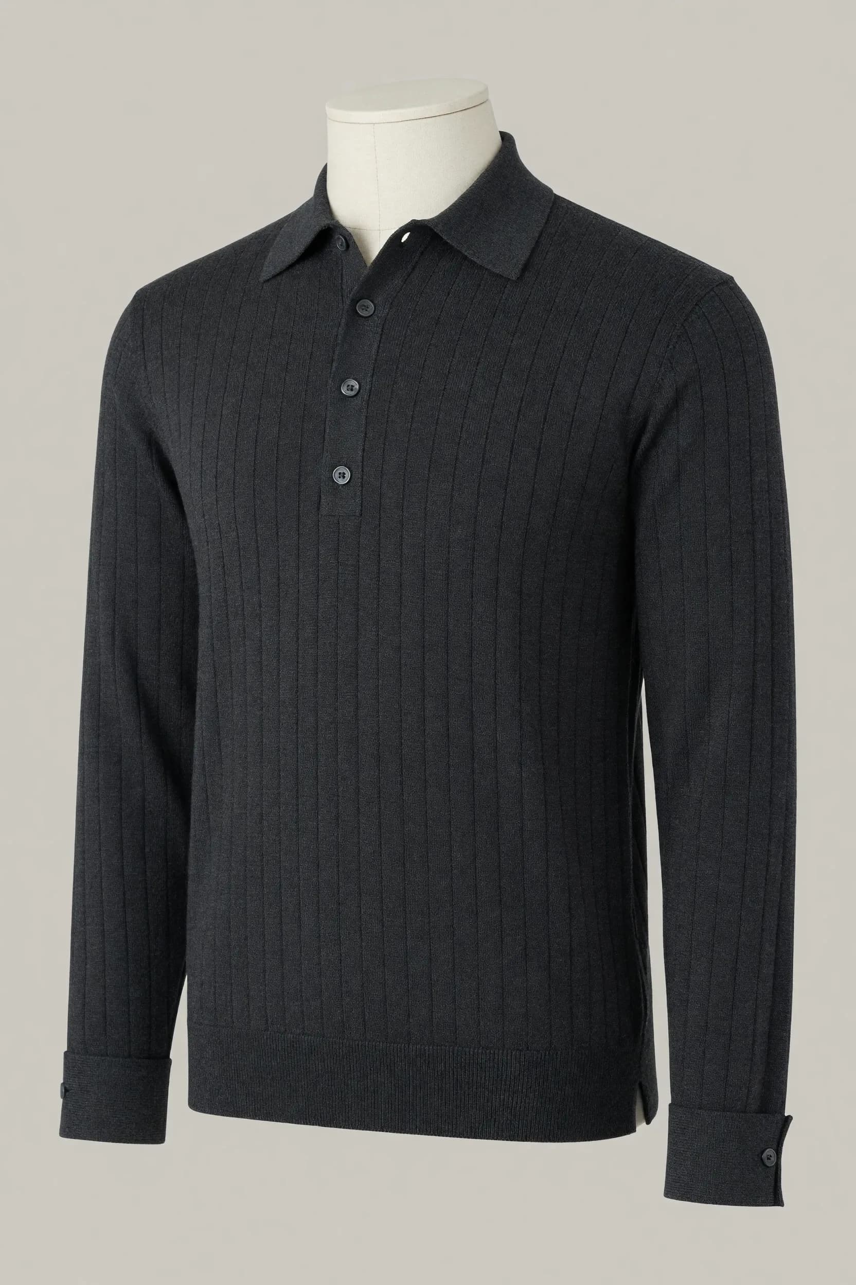 Charcoal fine-rib long-sleeve knit polo with multiple buttons, wide cuffs and side slits on a mannequin for private-label development