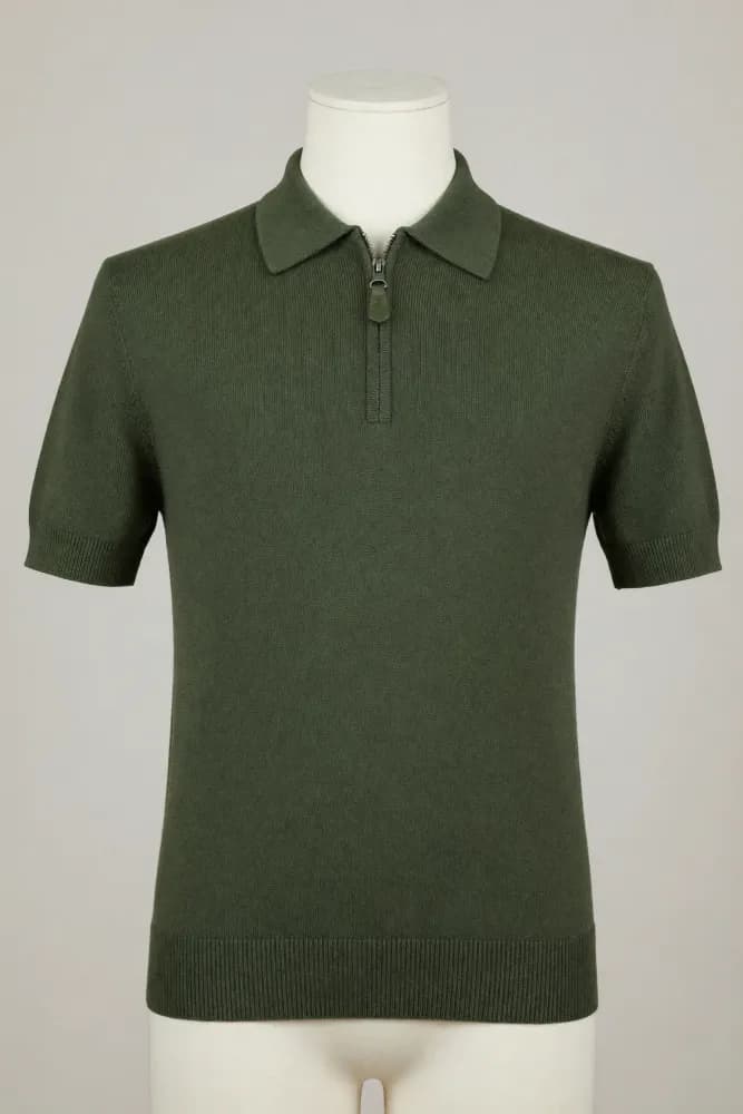 Moss-green quarter-zip short-sleeve knit polo with collar and ribbed edges displayed on a mannequin for private-label development
