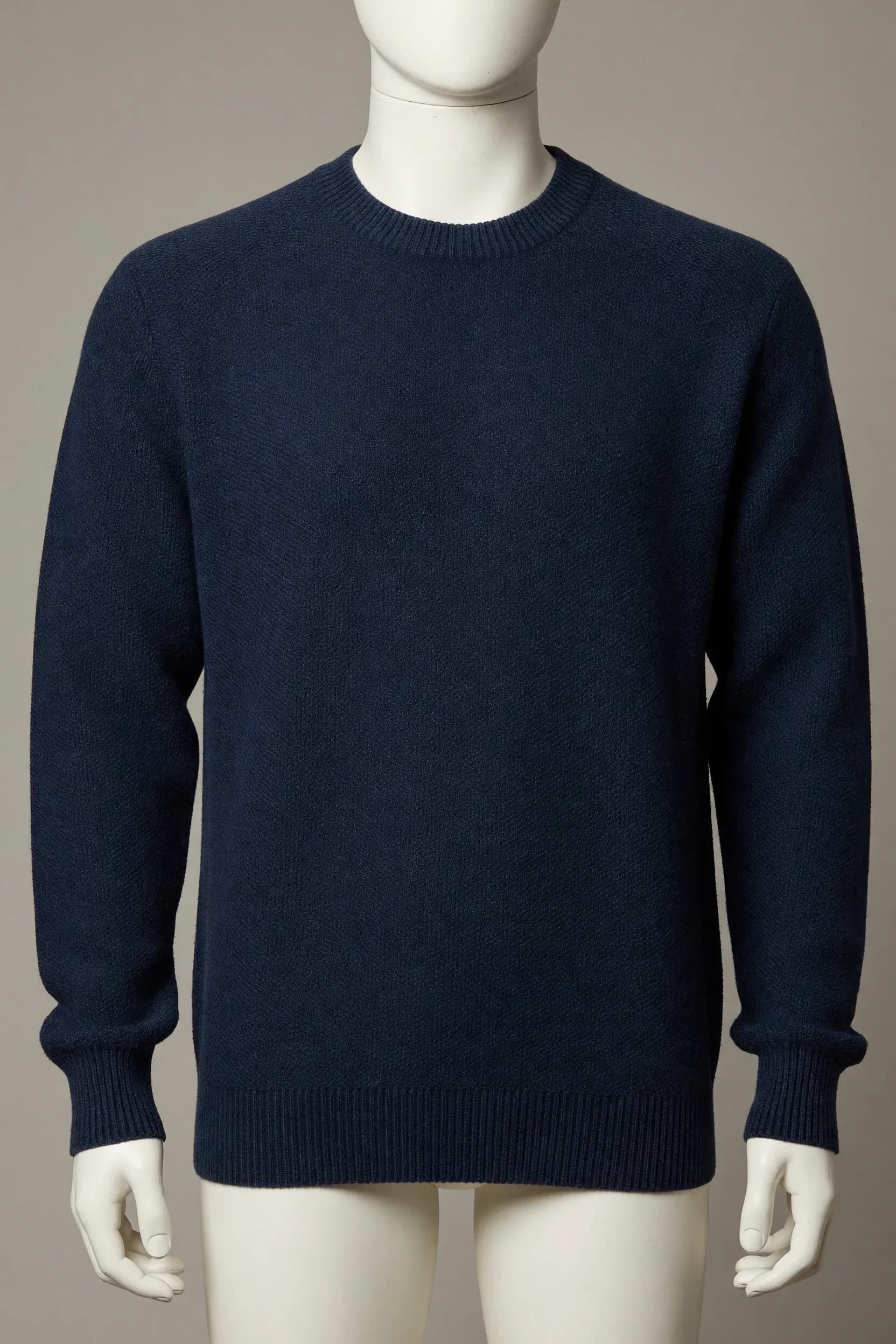 Navy long-sleeve crewneck sweater with deep rib cuffs and hem shown on a mannequin for private-label development